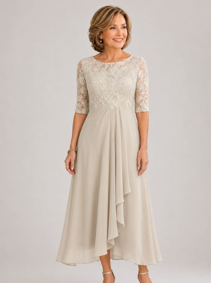 Zaria White – The Flattering Lace Midi Dress