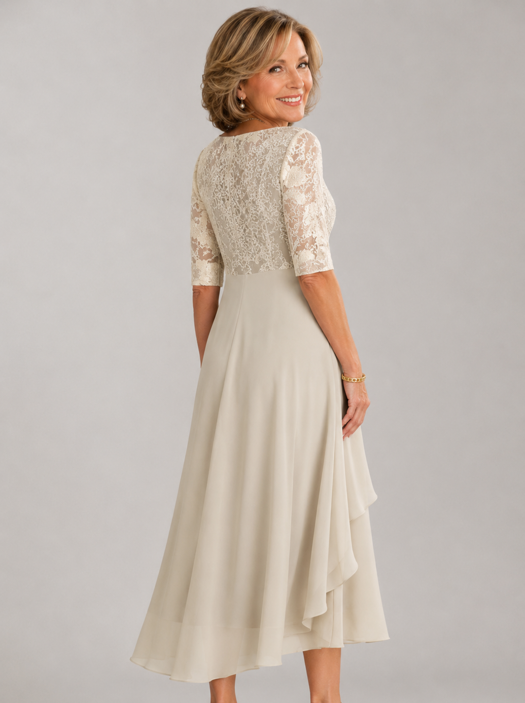 Zaria White – The Flattering Lace Midi Dress