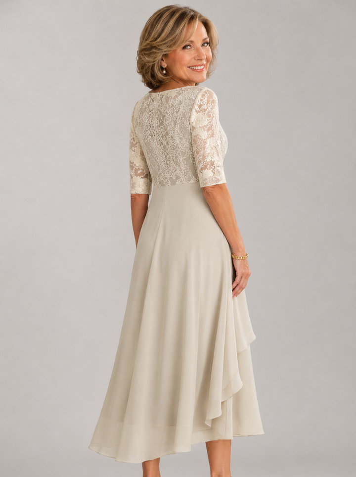 Zaria White – The Flattering Lace Midi Dress